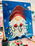 A Christmas Gnome carrying festive lights Paint and sip event in Adelaide